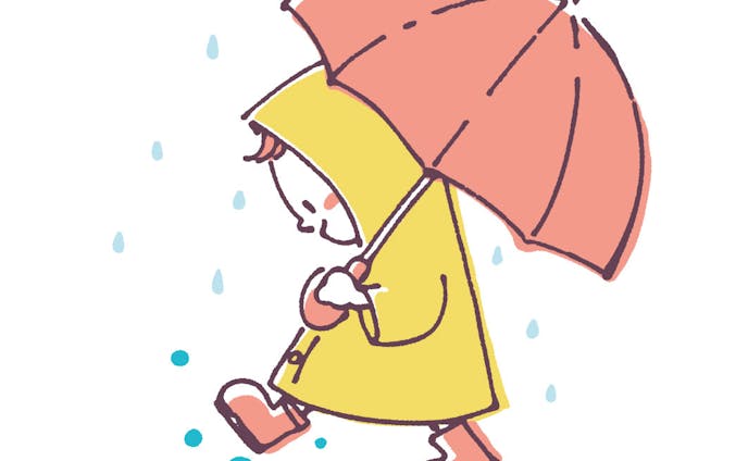 傘をさして歩く子供